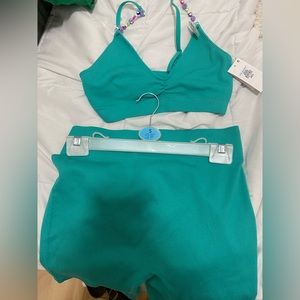 Brand new two piece workout/chilling. Blue/green color, very comfortable. Size S